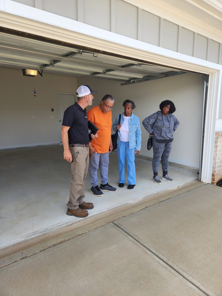 People standing in a garage